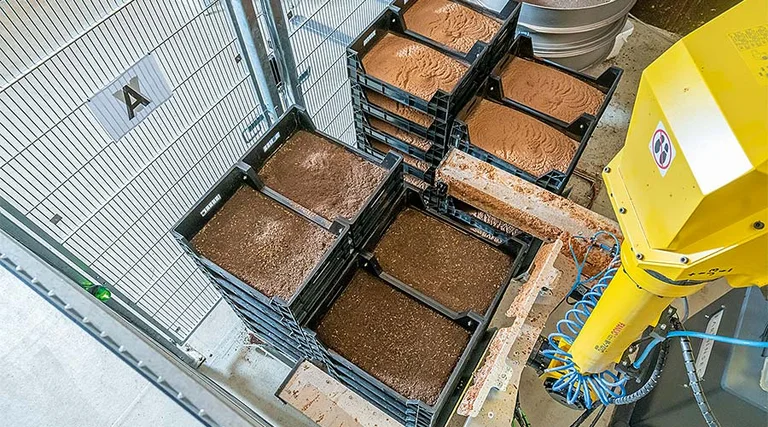 Figure 4: A robot separates the fully-grown larvae from the substrate, the so-called frass. Source: Better Insect Solutions Figure 4: A robot separates the fully-grown larvae from the substrate, the so-called frass. Source: Better Insect Solutions