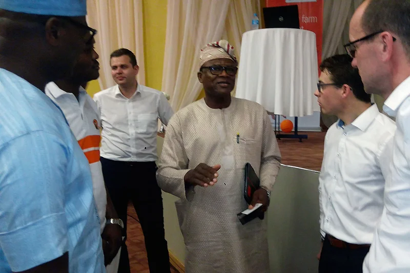Six attendees in a lively conversation
