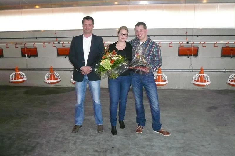 Congratulations on the new poultry house: The Big Dutchman sales executive brought along some presents