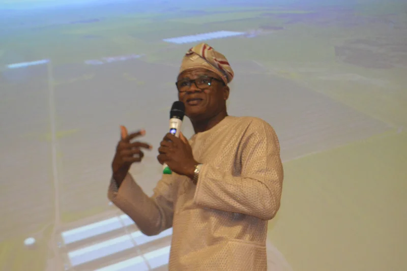 Professor Adesehinwa with microphone